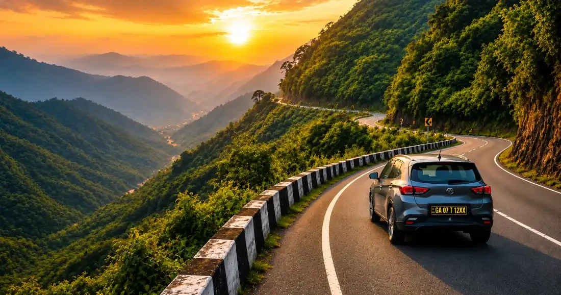 Self-drive rental car on a scenic road for an interstate trip from Goa